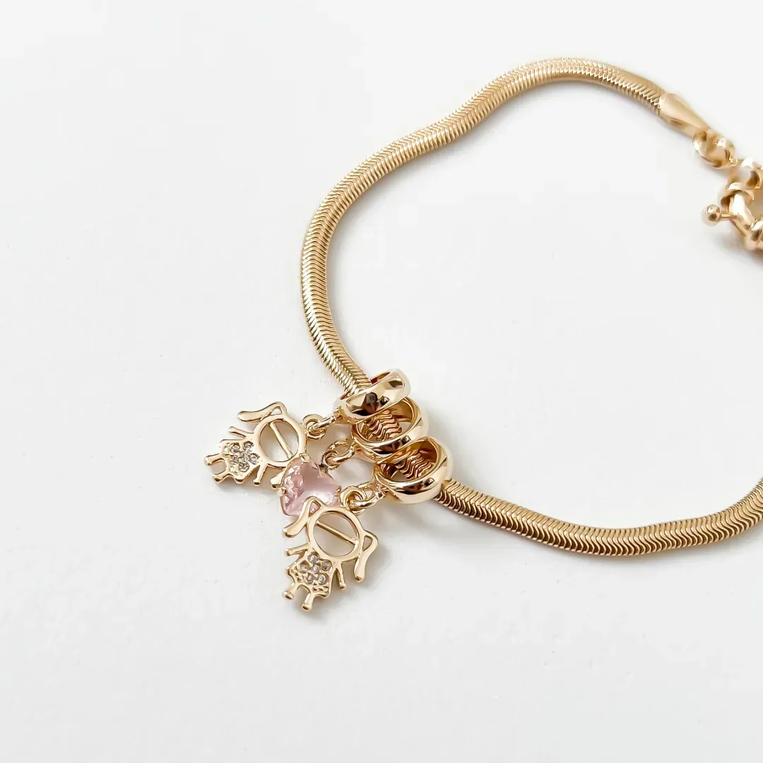 PULSEIRA FILHOS DUAS MENINAS COM CRISTAL ROSA BANHADO A OURO 18K